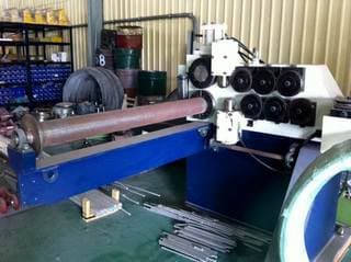 unwinding the coil and straightening the wire