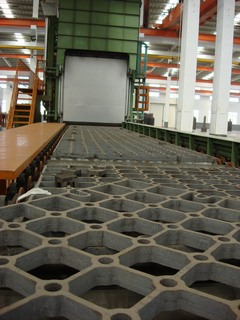 Back view of the furnace. Unloading unit for finished products.