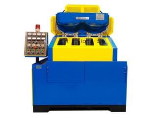 Thread rolling machines for nuts